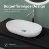 A white oval countertop sink with a chrome faucet on a dark wood vanity against a green textured wall. Produktbild-Vorschau