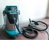 A Makita vacuum cleaner and a wall chaser are placed on the floor against a white wall. Podgląd zdjęcia produktu