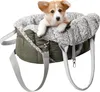 A puppy sits in a pet carrier bag. Náhled obrázku produktu