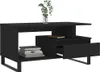 A black coffee table with a vase of plants on top and books on a shelf. Produktbild-Vorschau