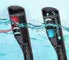Cutaway view of two snorkel masks submerged in water, illustrating internal mechanisms. Podgląd zdjęcia produktu
