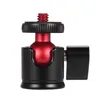 A close-up studio shot of a mini tripod ball head. Náhled obrázku produktu