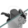 A close-up view of an aquarium filter attached to the glass of a tank. Anteprima dell’immagine prodotto