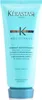A product shot of a turquoise tube of Kerastase hair conditioner against a white background. Náhled obrázku produktu