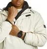 Close-up of a person wearing a beige jacket and a black watch. Produktbild-Vorschau