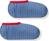 A pair of blue quilted boot socks with red trim. Produktbild-Vorschau