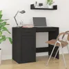 A black desk with a laptop, lamp, and chair in a room. Náhled obrázku produktu