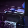 A gaming console is connected to a USB-C hub, which is then connected to a keyboard and mouse on a desk. Produktbild-Vorschau