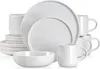 A stack of white ceramic plates, bowls, and mugs arranged on a white background. Produktbild-Vorschau