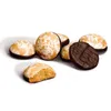 A group of gingerbread cookies with white icing and a dark chocolate-coated cookie on a white background. Náhled obrázku produktu