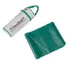 A green TheraBand exercise band and its cylindrical storage case are shown against a white background. Produktbild-Vorschau