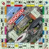 A Monopoly board game with a Leverkusen city theme, featuring aerial views of the city and its landmarks. Produktbild-Vorschau