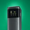 A close-up shot of a black power pack with a digital display showing charging information. Produktbild-Vorschau
