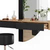 A close-up shot of a modern vanity table with makeup and plants. Anteprima dell’immagine prodotto