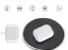 A white charging case is shown on a black wireless charging pad, with icons above indicating features. Produktbild-Vorschau