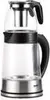 A clear studio shot of a glass electric tea maker with a stainless steel base and handle. Produktbild-Vorschau