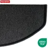 A close-up view of a dark grey, semi-circular carpet stair mat with a black border. Produktbild-Vorschau