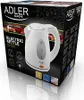 The image shows the packaging of an Adler electric kettle, with the kettle itself prominently displayed on the front. Voir les images du produit