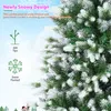 A close-up of a snow-flocked artificial Christmas tree with text overlays describing its features. Produktbild-Vorschau