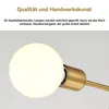 Close-up of a light bulb and part of a lamp fixture. Produktbild-Vorschau