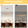 Two images of a pendant light over a dining table, one showing the light on and the other off. Voir les images du produit