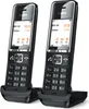 Two black Gigaset cordless phones are shown in their charging cradles against a white background. Anteprima dell’immagine prodotto