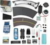 A flat lay of various components for a model car kit, including car parts, track pieces, and accessories. Náhľad obrázku produktu