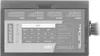 A close-up view of a computer power supply unit, showing its label with technical specifications. Produktbild-Vorschau