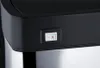 A close-up of a power switch on a black and silver appliance. Náhľad obrázku produktu