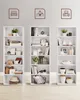 Three white bookshelves are displayed against a light gray wall, each with decorative items on its shelves. Above each bookshelf, there is a small icon representing a bedroom, an office, and a living room, respectively. Náhľad obrázku produktu