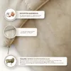 Close-up of a quilted pillow with informational callouts about its materials. Produktbild-Vorschau