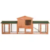A wooden rabbit hutch with a green roof, shown from the front against a white background. Produktbild-Vorschau