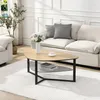 A modern living room scene featuring a coffee table with a vase of flowers and a cup of tea. Voir les images du produit