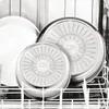 The bottom of two Tefal Ingenio pots are shown stacked inside a dishwasher. Produktbild-Vorschau