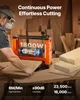 A person is using an orange thickness planer in a workshop setting with stacks of wood in the background. Náhľad obrázku produktu