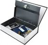 An open book-shaped safe is shown with various items inside, including a mobile phone, wallet, lighter, keys, coins, and banknotes. Anteprima dell’immagine prodotto