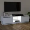 A white TV stand with a TV mounted above it, and a DVD player on the stand. Produktbild-Vorschau