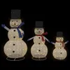 Three illuminated snowman figures of varying sizes against a black background. Náhled obrázku produktu
