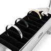 A jewelry organizer with several rings inside. Podgląd zdjęcia produktu