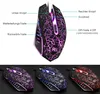A gaming mouse with LED lighting, shown with labels pointing to its features, and also shown in three different color variations. Produktbild-Vorschau