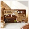 Kandylas Bio Halva Kakao 400 g Verpackung auf hellbeigem Stoff Produktbild-Vorschau