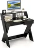 A black computer desk with a monitor, keyboard, mouse, books, and a clock on it. Produktbild-Vorschau