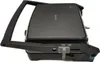 A close-up, angled view of a black electric grill machine against a white background. Voir les images du produit
