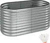 A silver, oval-shaped raised garden bed made of corrugated metal, shown from a slightly elevated side angle. A pair of white work gloves is placed in the bottom right corner. Voir les images du produit