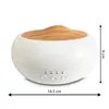 A white aroma diffuser with a wooden top, shown with dimensions. Podgląd zdjęcia produktu