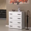 A white dresser with four drawers and an umbrella stand next to it, in a room with a painting on the wall. Produktbild-Vorschau