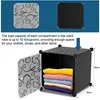 A modular storage cube with an open door, showing folded clothes inside, and diagrams of different cube designs above. Produktbild-Vorschau