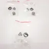 Three small plastic bags containing small electronic components, possibly hearing aid accessories, against a white background. Podgląd zdjęcia produktu