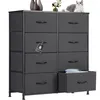 A chest of drawers with fabric drawers is shown, with a cat and decorative items on top. Voir les images du produit