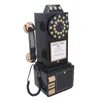 A vintage-style black rotary dial telephone ornament is displayed against a white background. Voir les images du produit